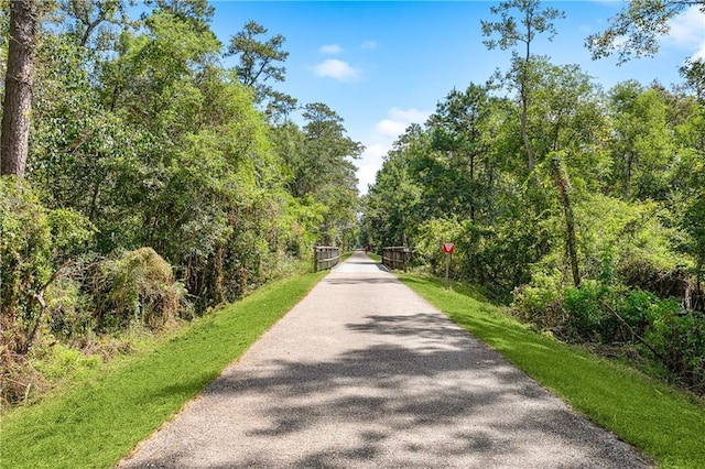 surrounding community with a forest view