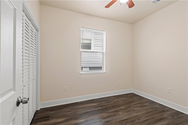 391214 Thalia St, New Orleans, LA 70125 - unfurnished room with visible vents, ceiling fan, baseboards, and dark wood-style floors