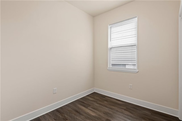 391214 Thalia St, New Orleans, LA 70125 - unfurnished room with baseboards and dark wood-style floors