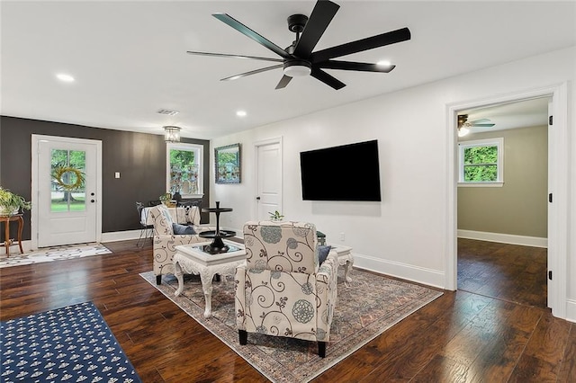 living area with ceiling fan, hardwood / wood-style flooring, recessed lighting, and baseboards