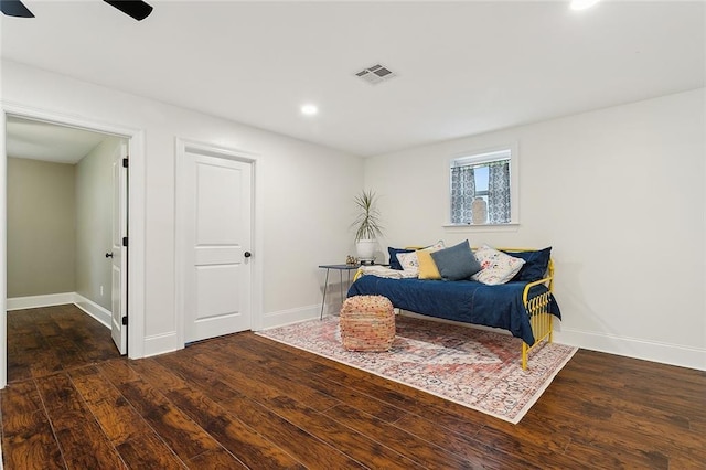 bedroom with visible vents, hardwood / wood-style flooring, recessed lighting, and baseboards