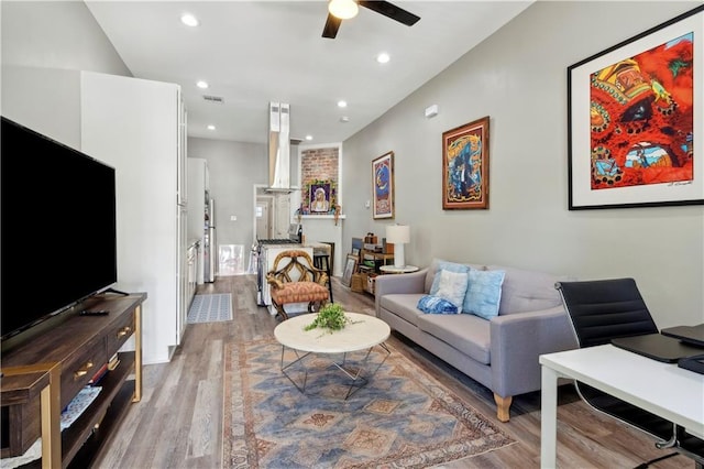202729 Cambronne St, New Orleans, LA 70118 - living area with light wood-style flooring, a ceiling fan, and recessed lighting