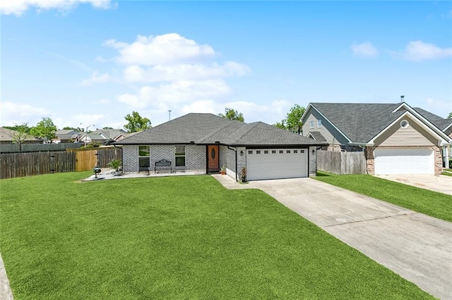 ranch-style house featuring fence, a garage, a front yard, and driveway