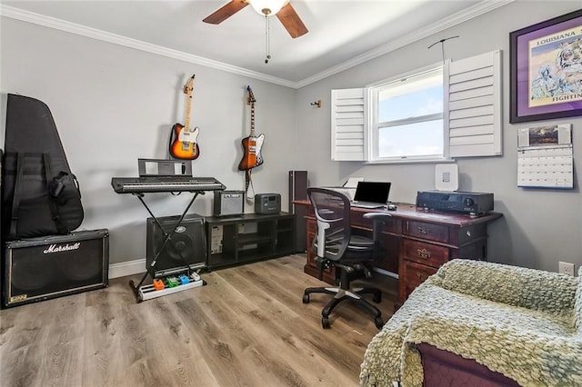 home office with baseboards, a ceiling fan, ornamental molding, and wood finished floors