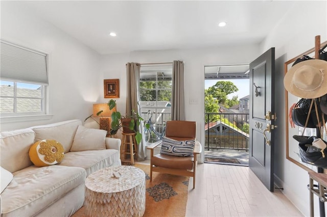 interior space with light wood-style floors and recessed lighting