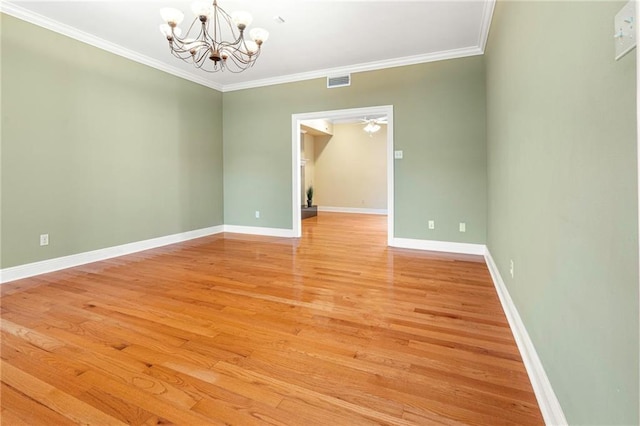 4516 Beau Lac Ln, Metairie, LA 70002 - unfurnished room featuring a chandelier, light wood-style floors, and ornamental molding
