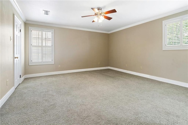 4516 Beau Lac Ln, Metairie, LA 70002 - empty room with ceiling fan, healthy amount of natural light, carpet flooring, and ornamental molding
