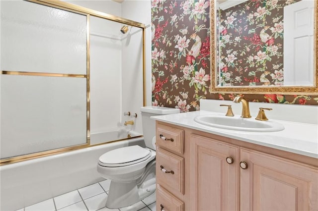 4516 Beau Lac Ln, Metairie, LA 70002 - full bathroom featuring wallpapered walls, vanity, tile patterned floors, and combined bath / shower with glass door