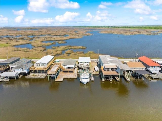 aerial view featuring a water view and a residential view
