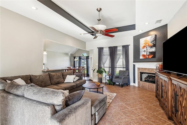 40339 Chandler Dr, Ponchatoula, LA 70454 - tiled living room with recessed lighting, a tile fireplace, visible vents, and a ceiling fan