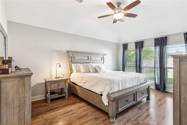 40339 Chandler Dr, Ponchatoula, LA 70454 - bedroom with wood finished floors, baseboards, a ceiling fan, and lofted ceiling