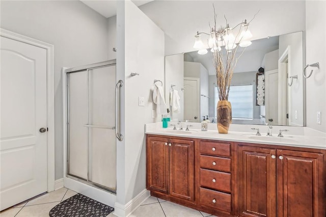 40339 Chandler Dr, Ponchatoula, LA 70454 - full bathroom with a shower stall, tile patterned floors, and a sink