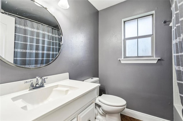 40339 Chandler Dr, Ponchatoula, LA 70454 - full bathroom with toilet, curtained shower, vanity, and baseboards