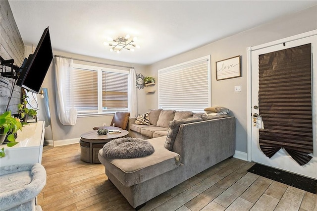 313 Alpaca Dr, Arabi, LA 70032 - living area featuring light wood finished floors and baseboards