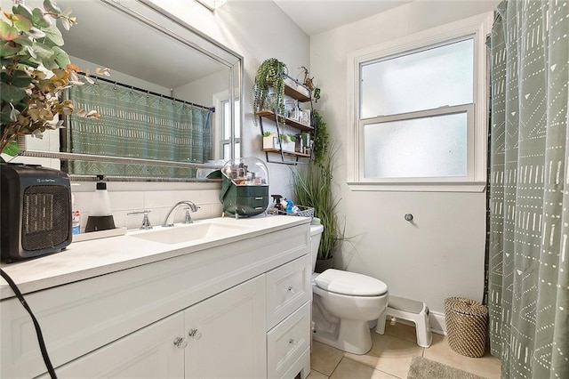 313 Alpaca Dr, Arabi, LA 70032 - bathroom with tile patterned flooring, toilet, vanity, and a shower with curtain