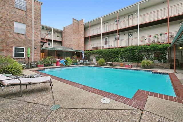 pool with a patio