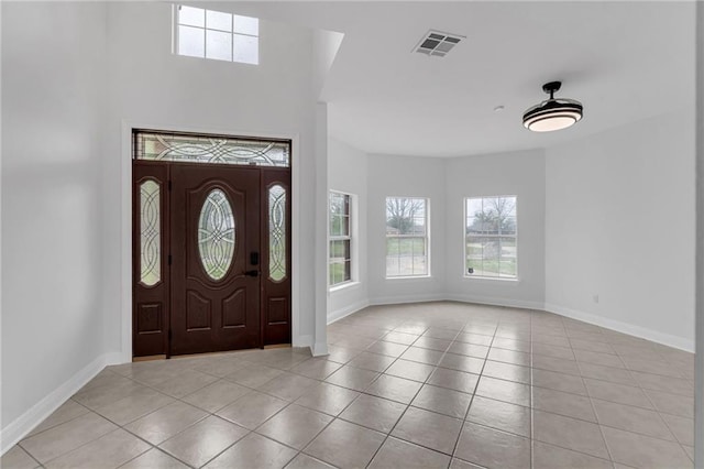 7721 Bullard Ave, New Orleans, LA 70128 - entrance foyer featuring visible vents, baseboards, and light tile patterned flooring