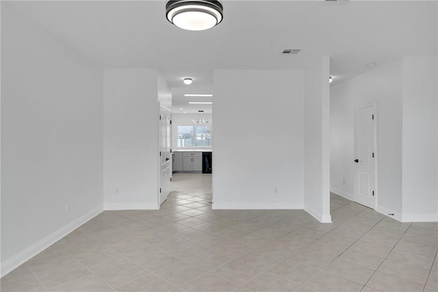 7721 Bullard Ave, New Orleans, LA 70128 - spare room with light tile patterned floors, baseboards, and visible vents