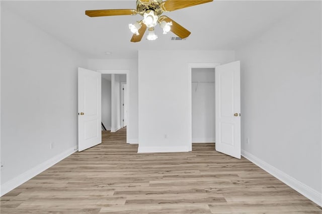 7721 Bullard Ave, New Orleans, LA 70128 - unfurnished bedroom featuring light wood-style flooring, a closet, baseboards, and ceiling fan