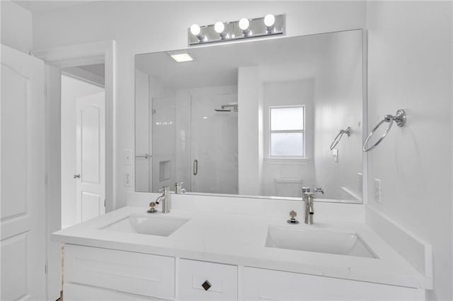 7721 Bullard Ave, New Orleans, LA 70128 - full bath with a sink, toilet, double vanity, and a stall shower
