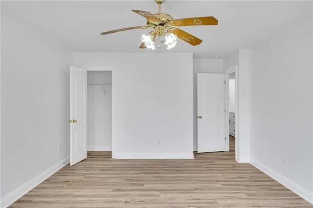 7721 Bullard Ave, New Orleans, LA 70128 - unfurnished bedroom featuring a closet, baseboards, light wood-type flooring, and ceiling fan