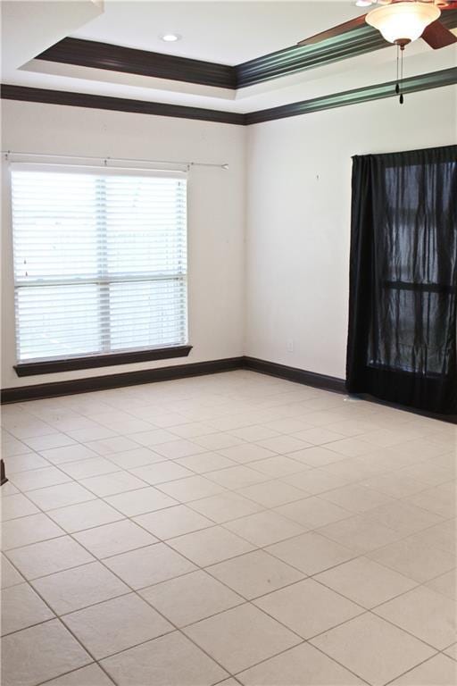 23620 Madisonville Ct, Ponchatoula, LA 70454 - empty room featuring baseboards, a raised ceiling, ceiling fan, and ornamental molding