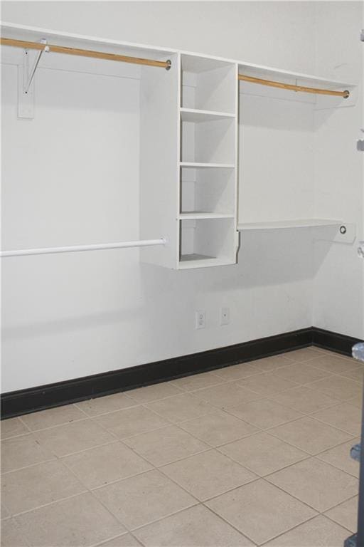 23620 Madisonville Ct, Ponchatoula, LA 70454 - interior space with baseboards and light tile patterned floors