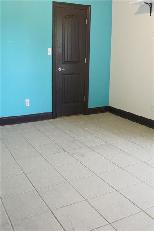 23620 Madisonville Ct, Ponchatoula, LA 70454 - empty room featuring baseboards and light tile patterned floors