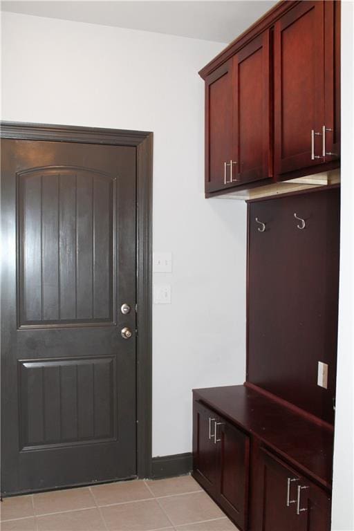 23620 Madisonville Ct, Ponchatoula, LA 70454 - mudroom with light tile patterned floors and baseboards
