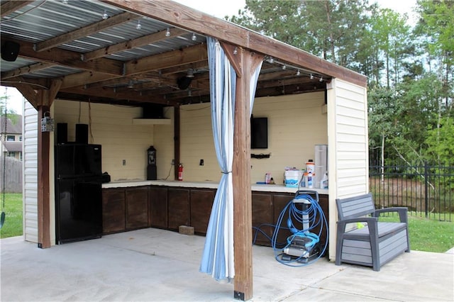 23620 Madisonville Ct, Ponchatoula, LA 70454 - view of patio / terrace featuring outdoor dry bar and fence