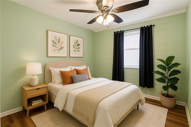 3420 Willow St, New Orleans, LA 70115 - bedroom featuring dark wood-style floors, a ceiling fan, and ornamental molding