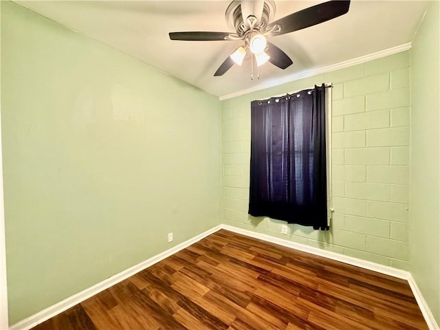 3420 Willow St, New Orleans, LA 70115 - unfurnished room with dark wood-type flooring, ceiling fan, and crown molding