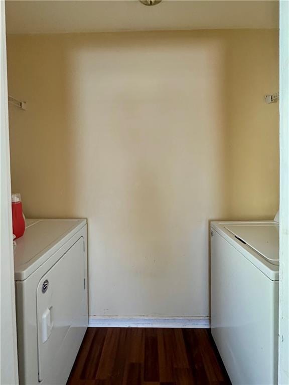 3420 Willow St, New Orleans, LA 70115 - washroom with independent washer and dryer and dark wood finished floors