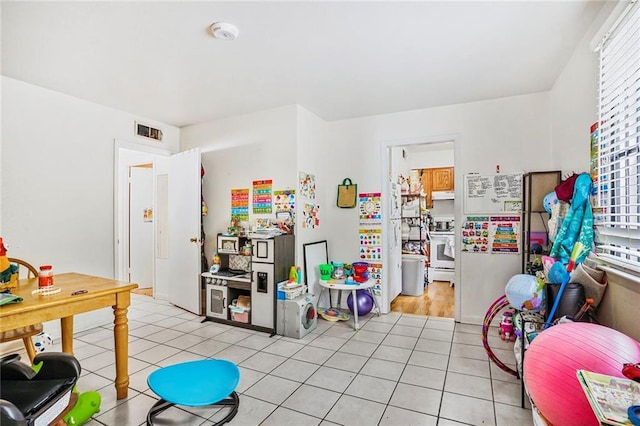 4018 Pitt St, New Orleans, LA 70115 - playroom featuring visible vents and light tile patterned floors