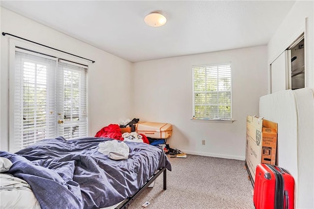 4018 Pitt St, New Orleans, LA 70115 - carpeted bedroom featuring baseboards and access to exterior