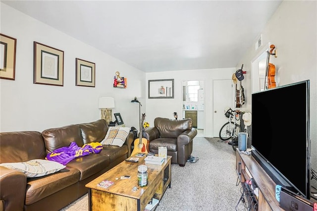 4018 Pitt St, New Orleans, LA 70115 - kitchen with stacked washer and dryer, under cabinet range hood, a sink, white dishwasher, and electric range oven