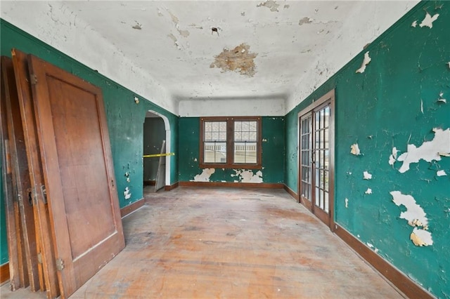 1318 Dublin St, New Orleans, LA 70118 - empty room with arched walkways and baseboards