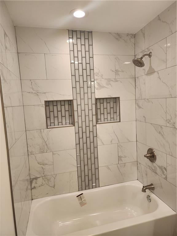 2417 Eagle St, New Orleans, LA 70118 - bathroom featuring shower / bathtub combination