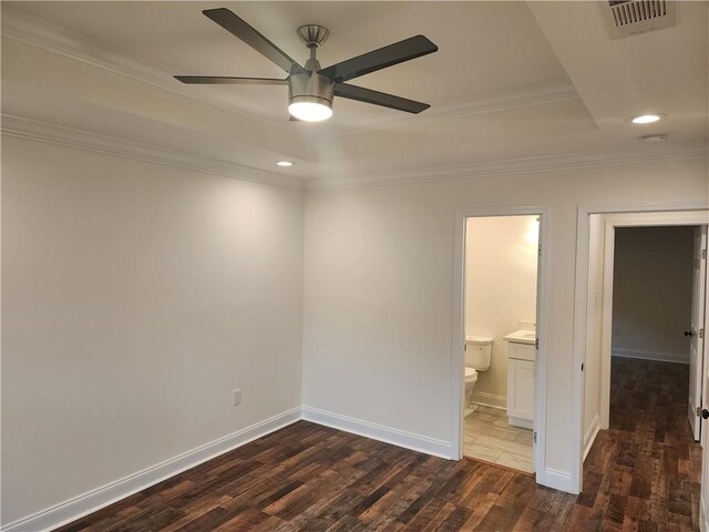 2417 Eagle St, New Orleans, LA 70118 - unfurnished bedroom featuring recessed lighting, crown molding, dark wood-type flooring, visible vents, and a tray ceiling