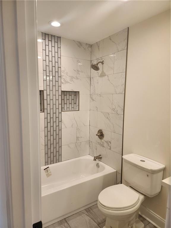 2417 Eagle St, New Orleans, LA 70118 - full bath with toilet, shower / tub combination, marble finish floor, and recessed lighting
