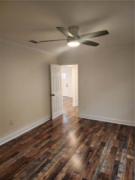 2417 Eagle St, New Orleans, LA 70118 - unfurnished room with visible vents, baseboards, a ceiling fan, dark wood-style floors, and crown molding
