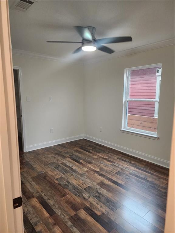 2417 Eagle St, New Orleans, LA 70118 - empty room with visible vents, baseboards, ornamental molding, ceiling fan, and dark wood-type flooring