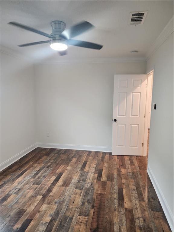 2417 Eagle St, New Orleans, LA 70118 - unfurnished room featuring dark wood-type flooring, crown molding, ceiling fan, and visible vents