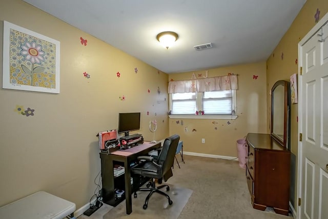 home office featuring light carpet, baseboards, and visible vents