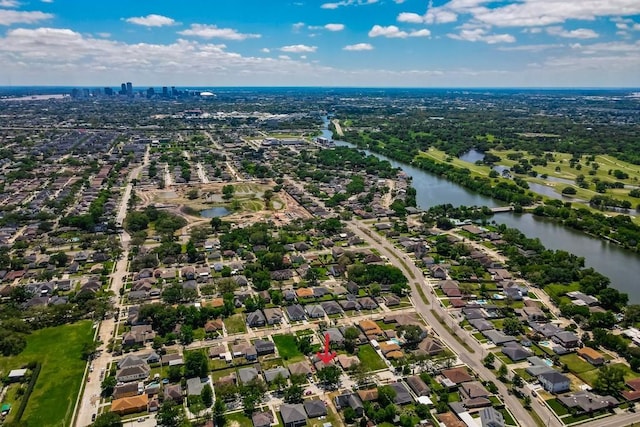 birds eye view of property featuring a residential view and a water view