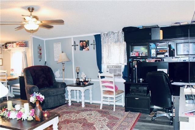 69476 S River Rd, Kentwood, LA 70444 - office area featuring wood finished floors, ornamental molding, and ceiling fan