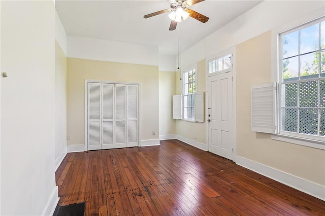101012 Philip St, New Orleans, LA 70130 - entrance foyer featuring dark wood-type flooring, ceiling fan, and baseboards