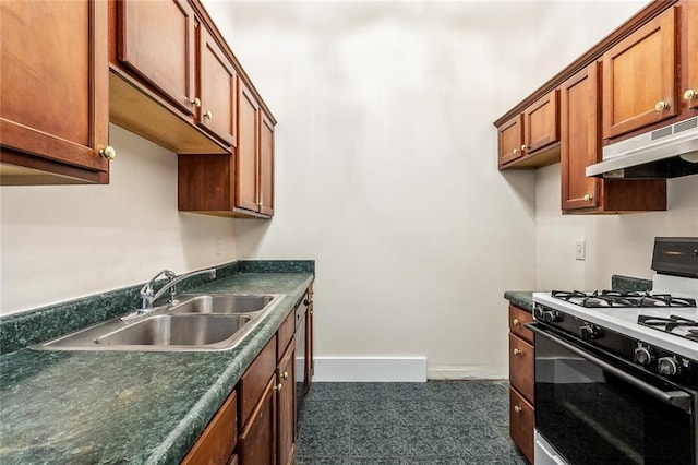 101012 Philip St, New Orleans, LA 70130 - kitchen featuring range with gas cooktop, under cabinet range hood, a sink, dark countertops, and baseboards