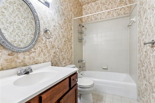 101012 Philip St, New Orleans, LA 70130 - full bath with vanity, toilet, bathtub / shower combination, tile patterned flooring, and wallpapered walls