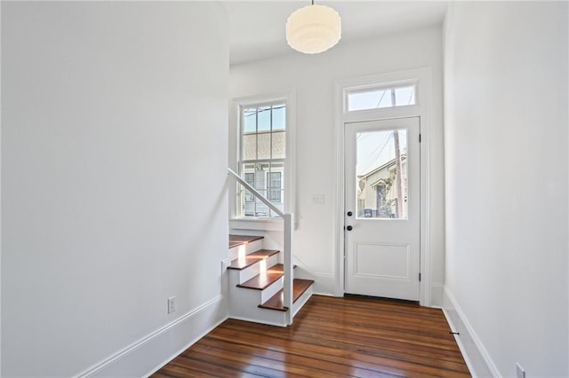 2623 Dauphine St, New Orleans, LA 70117 - entryway with stairs and wood finished floors